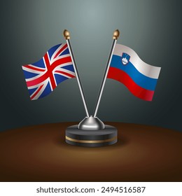 United Kingdom and Slovenia table flags mark the relationship on a gradient background