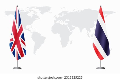 United Kingdom and Thailand flags for official meeting against background of world map.