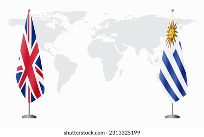 United Kingdom and Uruguay flags for official meeting against background of world map.