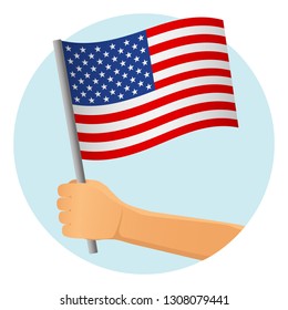 United States of America flag in hand. Patriotic background. National flag of United States of America vector illustration