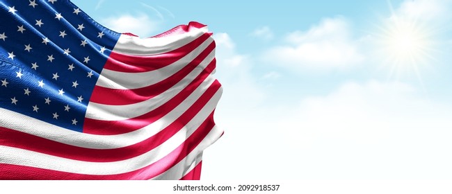 United States flag in the blue sky. Horizontal panoramic banner.