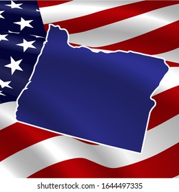 United States, Oregon. Dark blue silhouette of the state on its borders on the background of the USA flag.