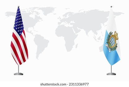 United States and San Marino flags for official meeting against background of world map.