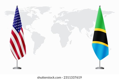 United States and Tanzania flags for official meeting against background of world map.