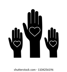 Unity in diversity glyph icon. Silhouette symbol. No to racism. Volunteers. Helping hands. Voting. Charity. Negative space. Vector isolated illustration