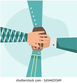 Unity, hands of diverse group of people putting together, teamwork.