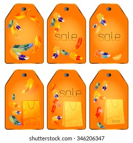Universal set of tags for various goods. At the tags are located feathers and lettering sale.