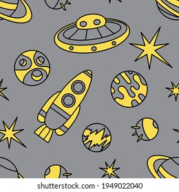 The universe, the cosmos. Seamless pattern. Doodles of planets, stars, spaceships, and satellites. Vector grey and yellow background