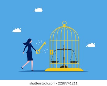Unlock justice or equality. Businesswoman unlocks the scales in the birdcage. business concept