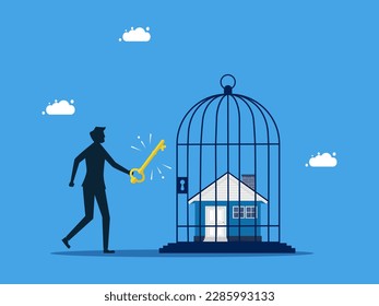 Unlock the value of the asset. man uses a key to unlock a house from a birdcage. business and investment concept