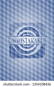 Unmistakable blue emblem with geometric pattern background.