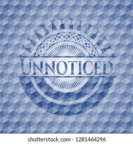 Unnoticed blue emblem with geometric pattern background.
