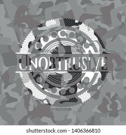 Unobtrusive grey camo emblem. Vector Illustration.