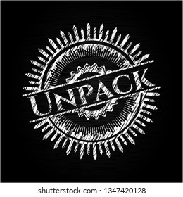 Unpack chalkboard emblem written on a blackboard Unpack chalkboard emblem written on a blackboard