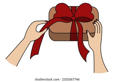 Unpacking the gift. European hands and craft box with a present. Colored vector illustration. Tie a red bow on a surprise. Isolated background. Pack a gift in a box. Cartoon style. Happy new year 