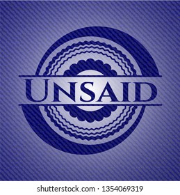 Unsaid badge with jean texture