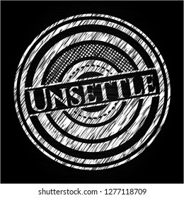 Unsettle written on a chalkboard