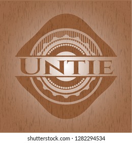 Untie wood emblem. Vintage.