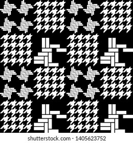 Unusual dark hounds tooth print. Seamless black and white pattern with geometric elements. Autumn textile collection.