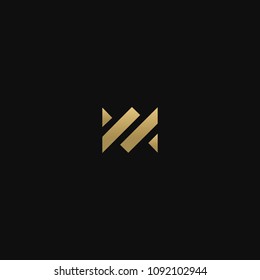 Unusual modern creative attractive M business brands black and golden color initial based letter icon logo.
