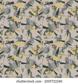 Unusual UFO camouflage - seamless vector pattern. Colorful print in yellow, green and gray colors. Bright abstract background, wallpaper, backdrop, cover, decoration