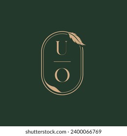 Concepto de plumas UO diseño de logo de monograma de boda como inspiración