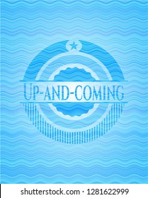 Up-and-coming light blue water style badge.