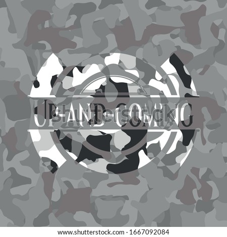 Up-and-coming on grey camouflaged texture