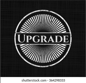 Upgrade chalk emblem written on a blackboard