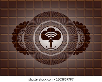 upload icon inside chocolate realistic badge. Brown chic background. Vector illustration. 