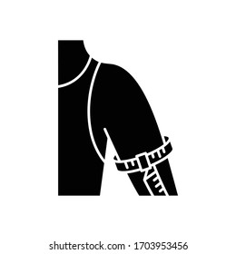 Upper arm circumference black glyph icon. Human body measurements, dimensions specification silhouette symbol on white space. Bespoke suit sleeve width determination. Vector isolated illustration