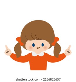 Upper body of a girl pointing with the index fingers of both hands.