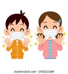 The upper body of a smiling sibling who washed his hands and put on a mask