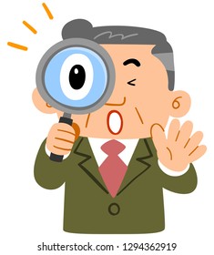 The upper half of the businessman's middle age surprised at peering into the magnifying glass