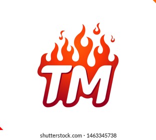 Uppercase initial logo letter TM with blazing flame silhouette,  simple and retro style logotype for adventure and sport activity.