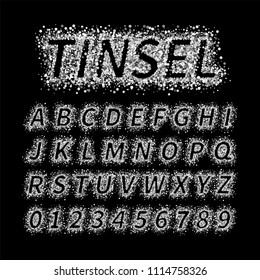 Uppercase italic display font include letters and numbers. Glitter confetti alphabet with silver dust for title, header, lettering, poster, greeting card, invitation, banner. Vector illustration.