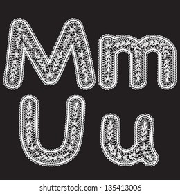 Uppercase and lowercase letters M and U are written by white lace. Lace type font for the inscriptions.