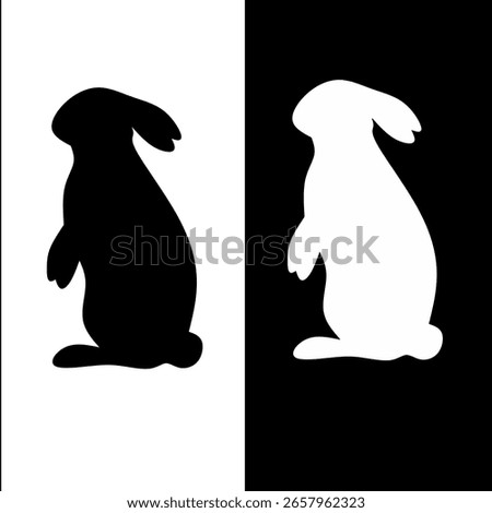 Upright rabbit silhouette with floppy ears