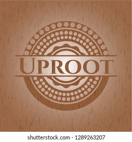 Uproot badge with wood background