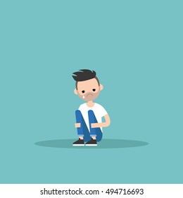 Upset crying bearded guy sitting and hugging his knees / editable flat vector illustration