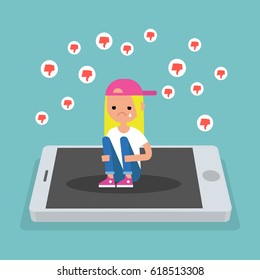 Upset crying girl sitting on the mobile's screen and hugging her knees surrounded by the dislike symbols / editable flat vector illustration, clip art