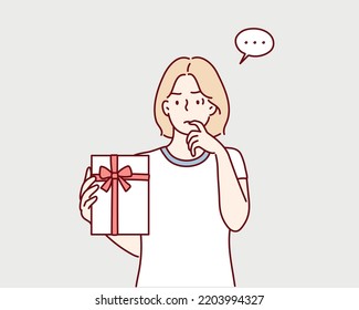 Upset man because of unhappy boring present. Hand drawn style vector design illustrations.