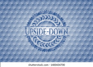 Upside-down blue emblem with geometric pattern. Vector Illustration. Detailed.