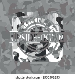 Upside-down on grey camo pattern