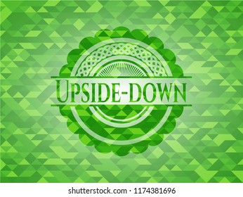 Upside-down realistic green emblem. Mosaic background