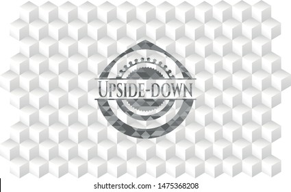 Upside-down realistic grey emblem with geometric cube white background