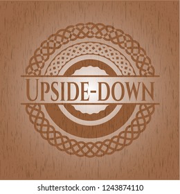 Upside-down wooden emblem