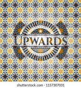 Upwards arabic badge. Arabesque decoration.