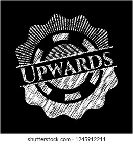 Upwards chalk emblem written on a blackboard