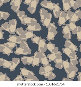 Urban camouflage of various shades of beige and blue colors. It is a colorful seamless pattern that can be used as a camo print for clothing and background and backdrop or computer wallpaper